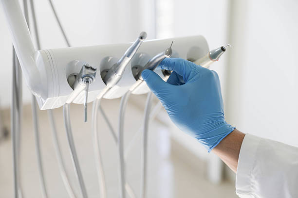 Professional Tooth Extraction technician working in Benton Heights, MI